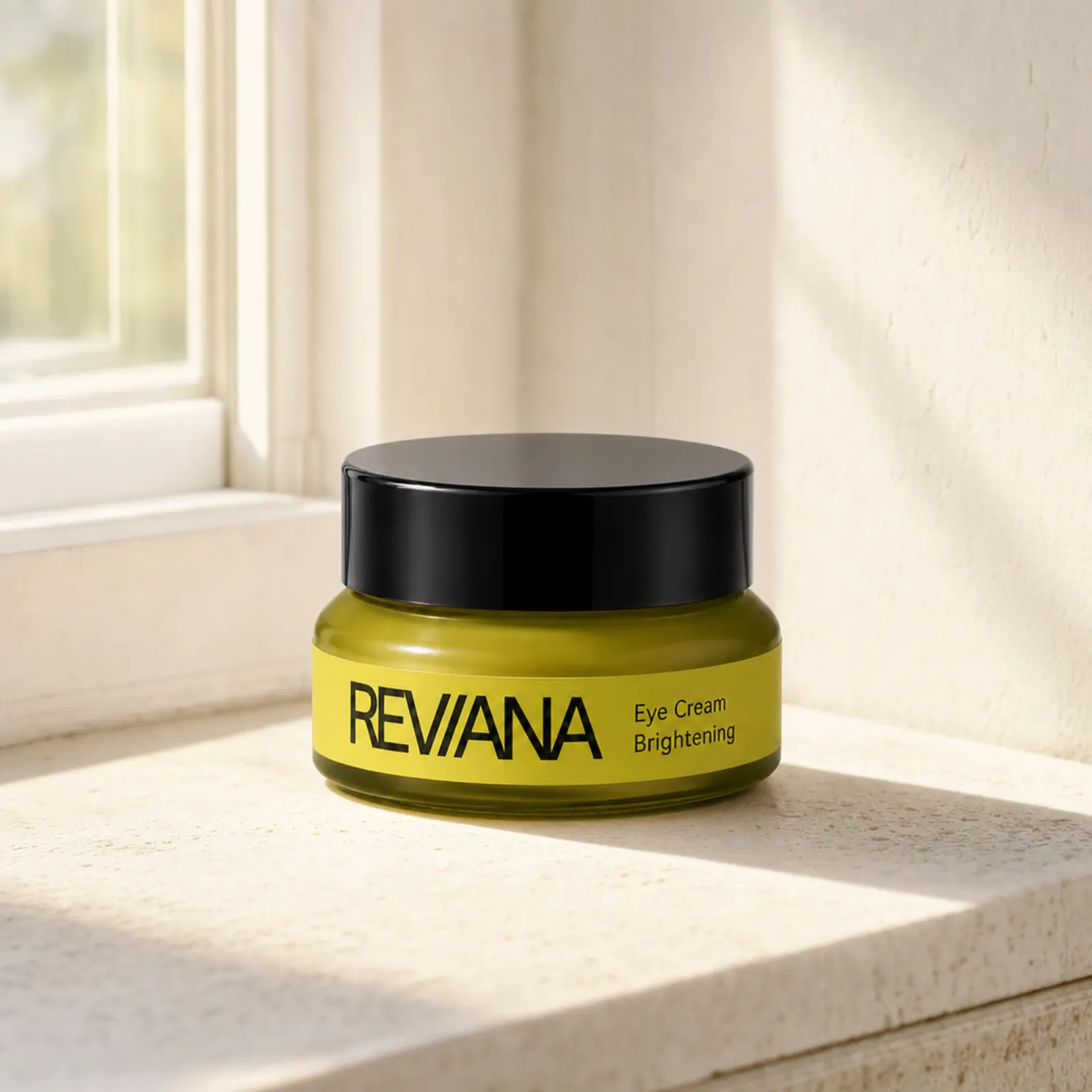 The Reviana jar on a pale stone windowsill in soft morning light